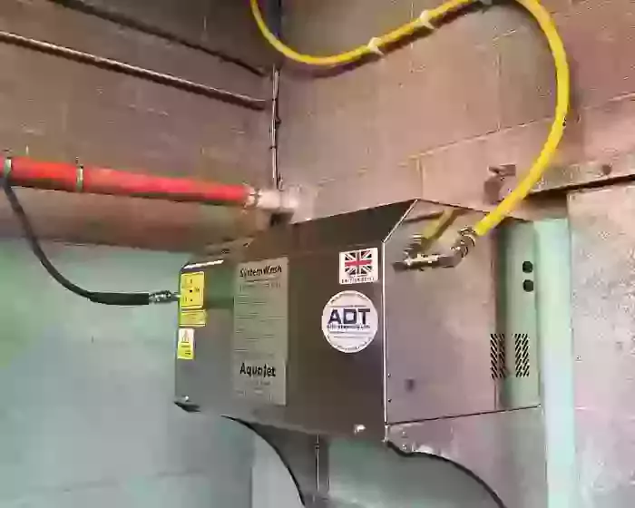 Stainless steel AquaJet 3 wall-mounted pressure washer installed at a dairy farm in Atherstone, raised for safety and protection.